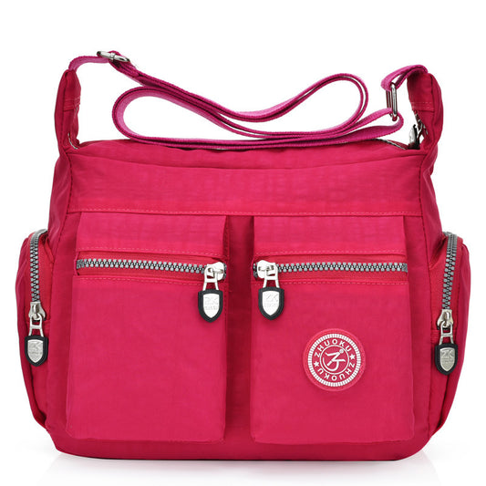 Red Hand Bag With Satchel Strap, And Zipper Pockets 