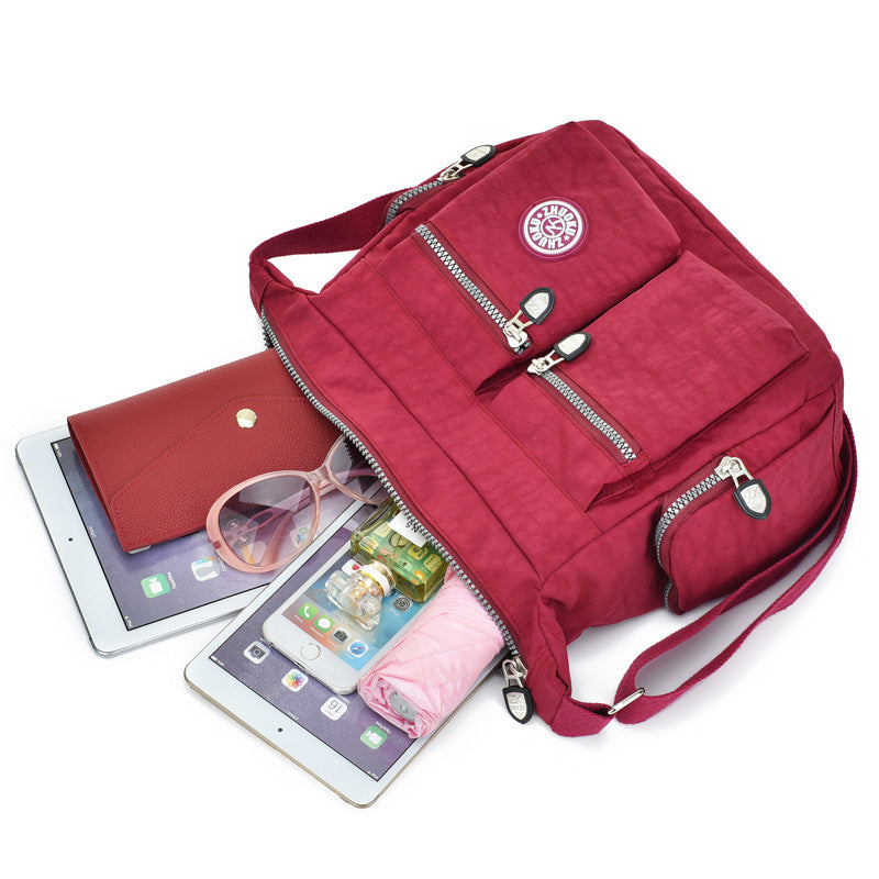 Hand Bag With Ipad Tablet, Sunglasses, Phone, Wallet, And Other Material 